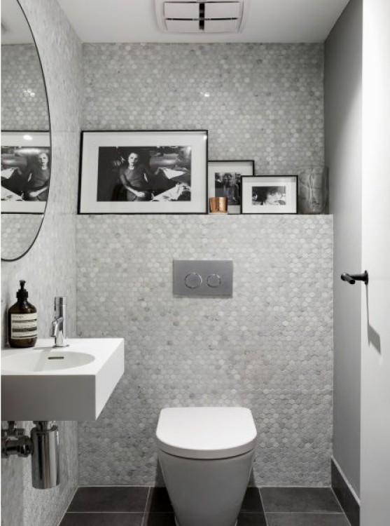 Love the 'Glacier Hex' mosaic tiles, love the colour scheme, love the collection of photographs and love the round 'Flynn' mirror - a perfect balance between a masculine colour scheme and feminine design elements. Dea and Darren truly know where a lady likes to powder her nose.